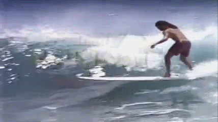 A surfer with the words "johnny tsunami"