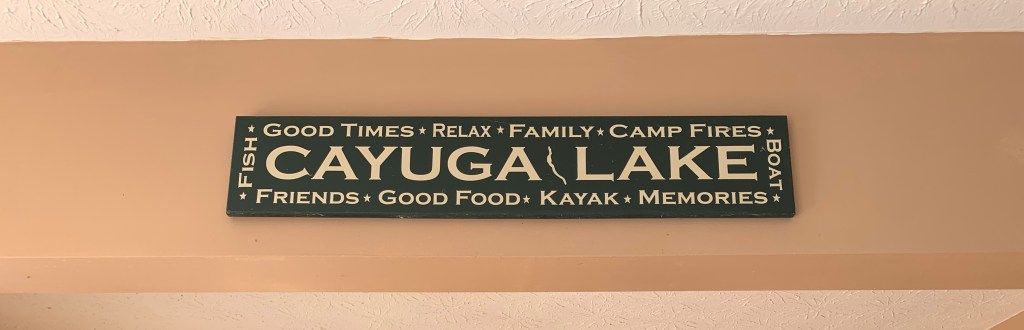 a cheesy lakehouse sign