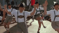 German men dancing in traditional outfits